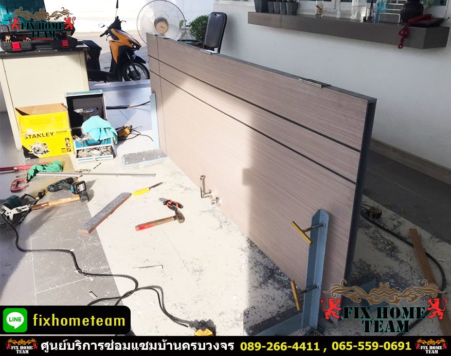 ช่างซ่อมประตูไม้เปิด-ปิดยาก